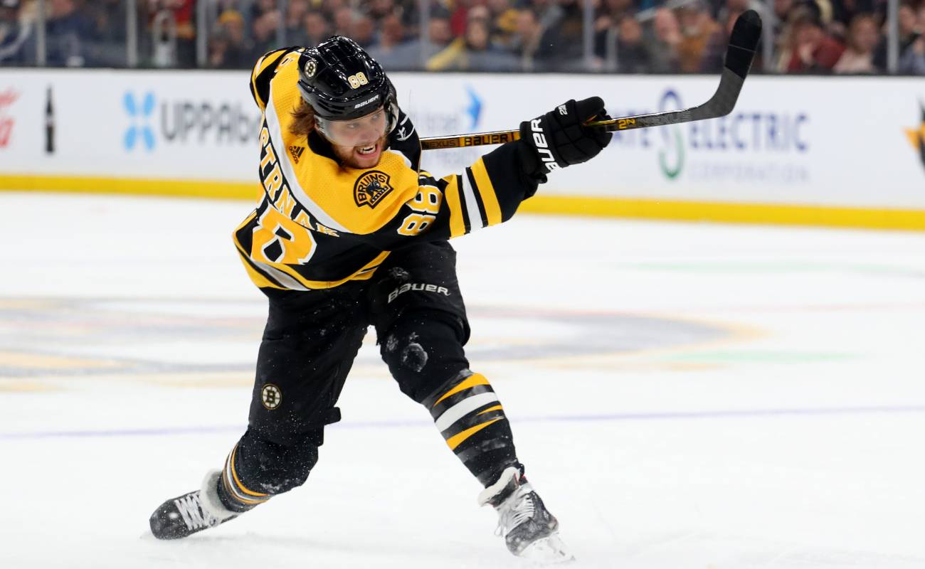  David Pastrnak #88 of the Boston Bruins takes a shot at TD Garden