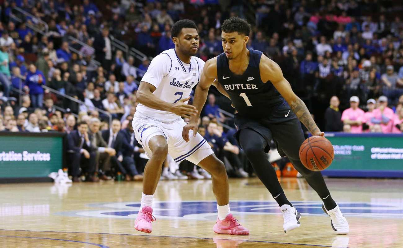 Jordan Tucker #1 of the Butler Bulldogs in action against Anthony Nelson #2 of the Seton Hall Pirates 