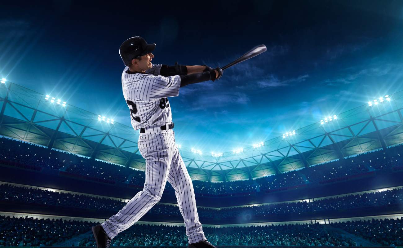 Professional hitter playing baseball on the grand arena in night