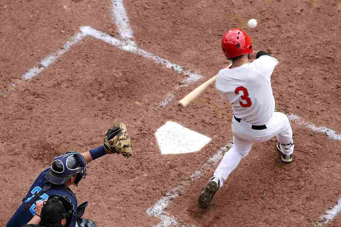 baseball batter taking a swing at the ball